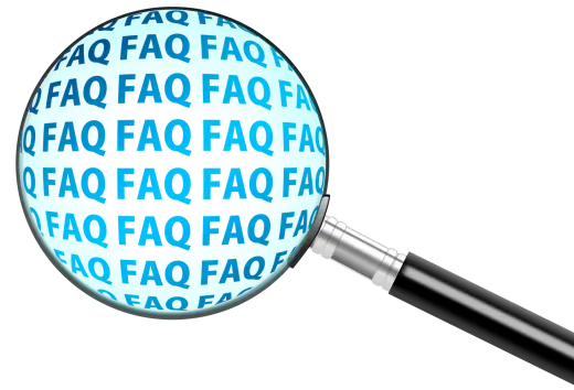 Looking glass displaying the words FAQ