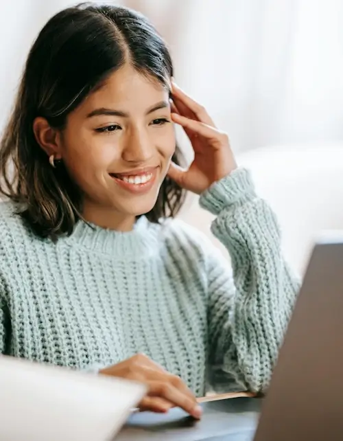 A student with the laptop during an online lesson