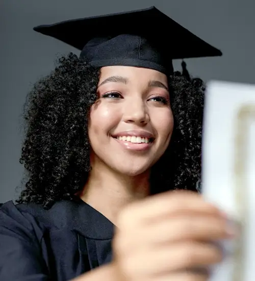 Student is wearing a graduation hat