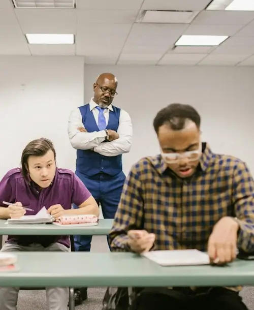 Students and invigilator during an exam